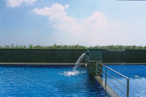 Outdoor pool - Luxurious 1BR Apartment at Belmont Residence (Jakarta)