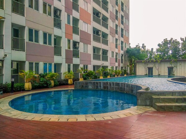 Outdoor pool - Comfy and Homey Studio at Grand Sentraland Karawang Apartment (Karawang)