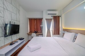 Free WiFi, bed sheets - Comfy and Homey Studio at Grand Sentraland Karawang Apartment (Karawang)