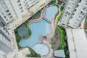 Front of property - Homey and Cozy Studio Casa De Parco Apartement (Pagedangan)
