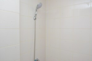 Room | Bathroom | Shower, free toiletries, towels - Alluring Studio at Lagoon Apartment near Bekasi Town Square (Bekasi)