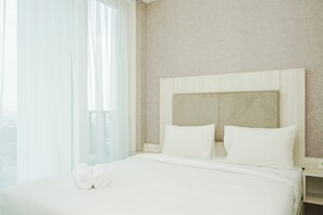 Room | Free WiFi, bed sheets - Comfy and Minimalist Studio Apartment at Tree Park BSD (South Tangerang)