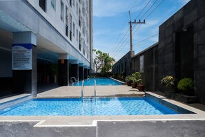 Outdoor pool - Trendy and Tidy Studio Room at Puri Mas Apartment (Surabaya)