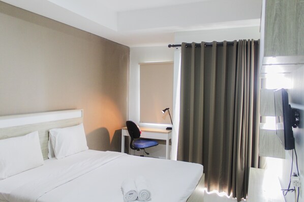 Room | Bed sheets - Fully Furnished with Cozy Design Studio Apartment Springwood Residence (Tangerang)