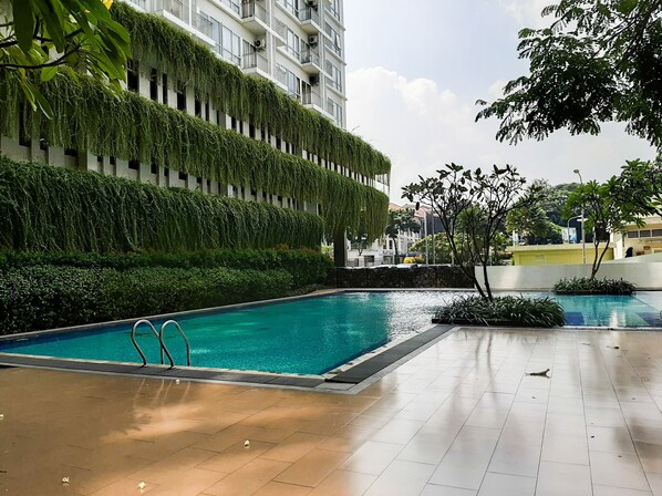 Outdoor pool - Stylish and Modern Studio Apartment at Bintaro Plaza Residence (South Tangerang)