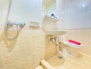 Room | Bathroom | Shower, free toiletries, towels - Simply 2BR at Majesty Apartment (Bandung)