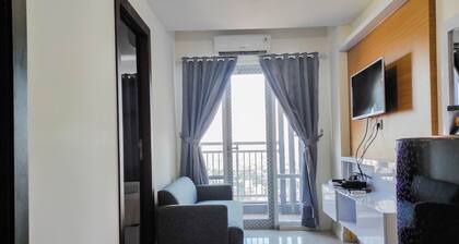 Homey and Comfy 2BR at Vida View Apartment