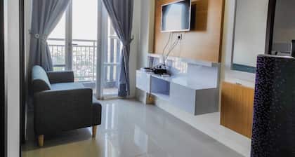 Homey and Comfy 2BR at Vida View Apartment