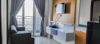 Homey and Comfy 2BR at Vida View Apartment