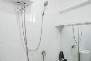 Bathroom - Elegant 2BR at Bassura City Apartment (Jakarta)