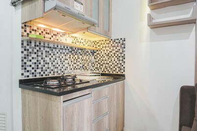 Cozy Stay at 2BR Green Pramuka Apartment near Shopping Center