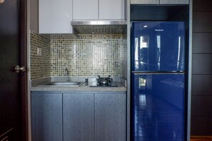 Camera | Cucina privata | Frigorifero, piano cottura, pentole/stoviglie/utensili