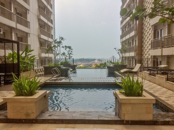 Outdoor pool - Classic and Nice Studio Room Annora Living Apartment (Tangerang)