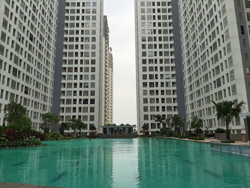 M-Town Residence的舒适带花园景观的工作室公寓