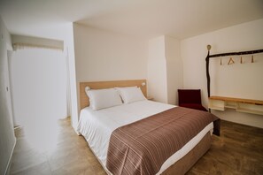 Apartamento, 1 quarto | 2 quartos, quartos à prova de som, Wi-Fi de cortesia, roupa de cama