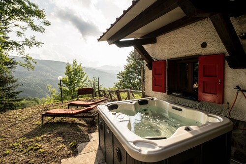 Chalet con giardino, terrazza e vista panoramica