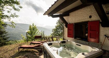 Chalet con giardino, terrazza e vista panoramica