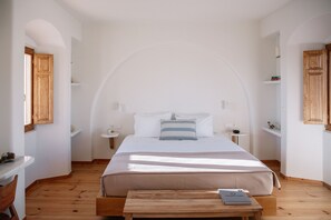 Suite Deluxe, vue sur la mer | Literie de qualité, minibar, coffre-fort, décor unique