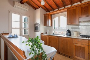 Oven, stovetop, dishwasher, coffee/tea maker