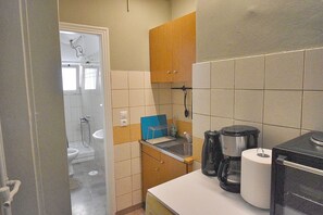 Double Room | Private kitchen | Full-size fridge, oven, stovetop, electric kettle