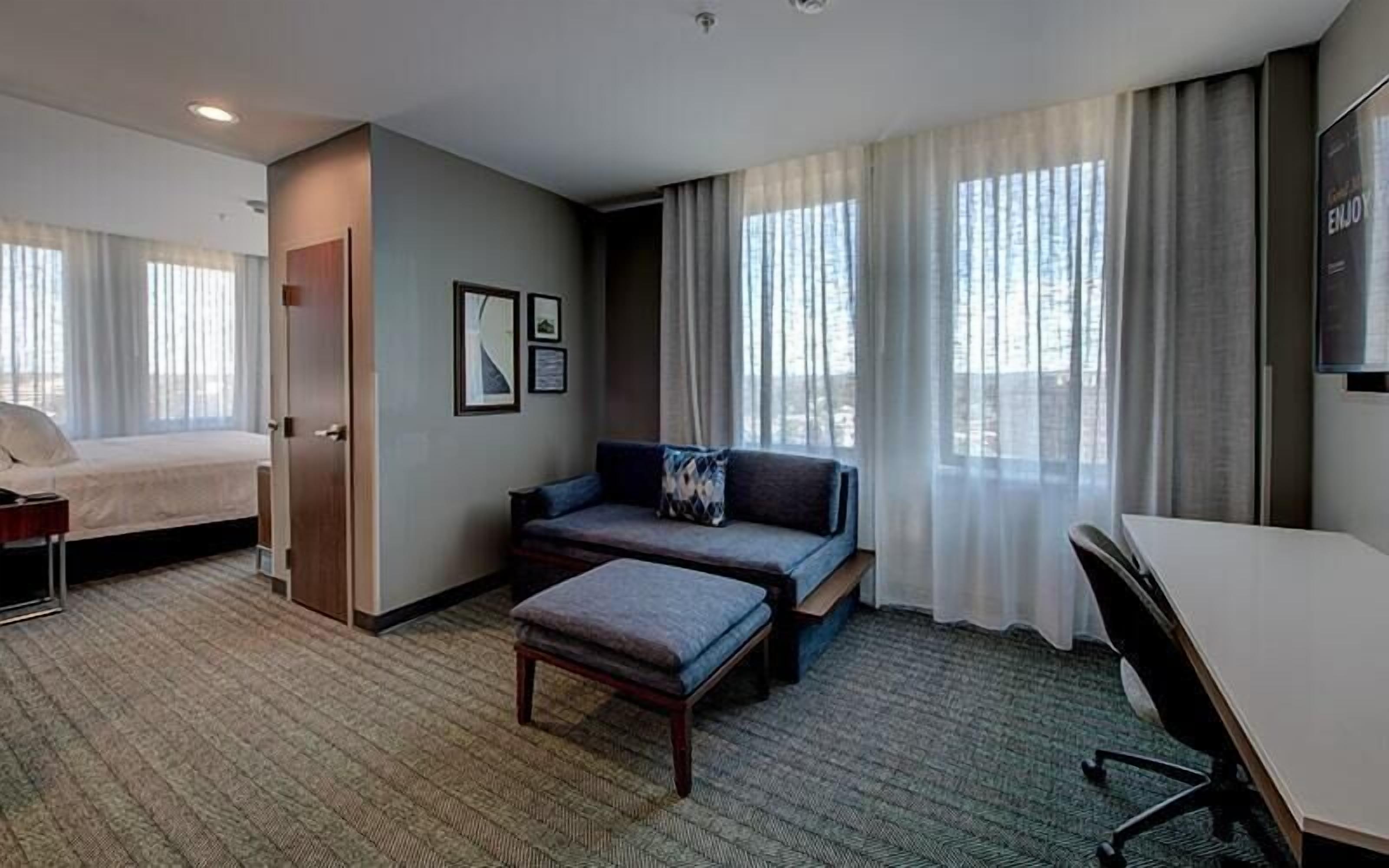 suite, 1 bedroom, city view | in-room safe, blackout curtains, iron/ironing board