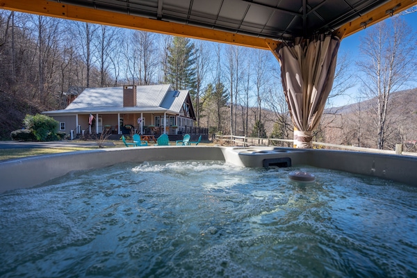 Enjoy the breathtaking mountain views as you soak your stress away.