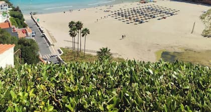 Beachfront, ocean view, just a step from the sand