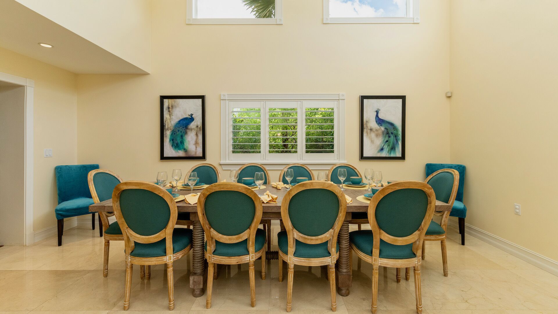 The dining area is located just off the kitchen and filled with natural light...