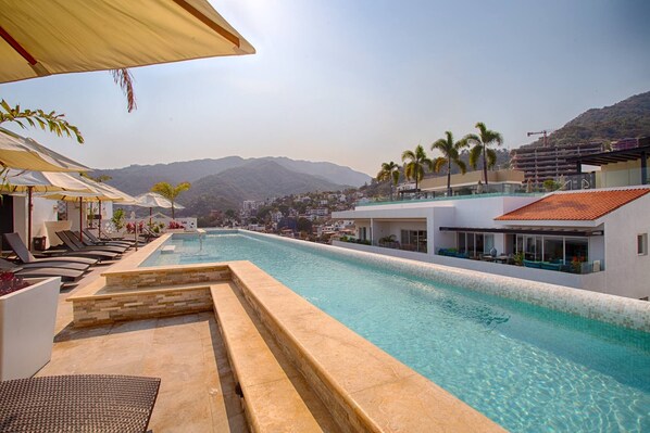 Rooftop pool with mountain views