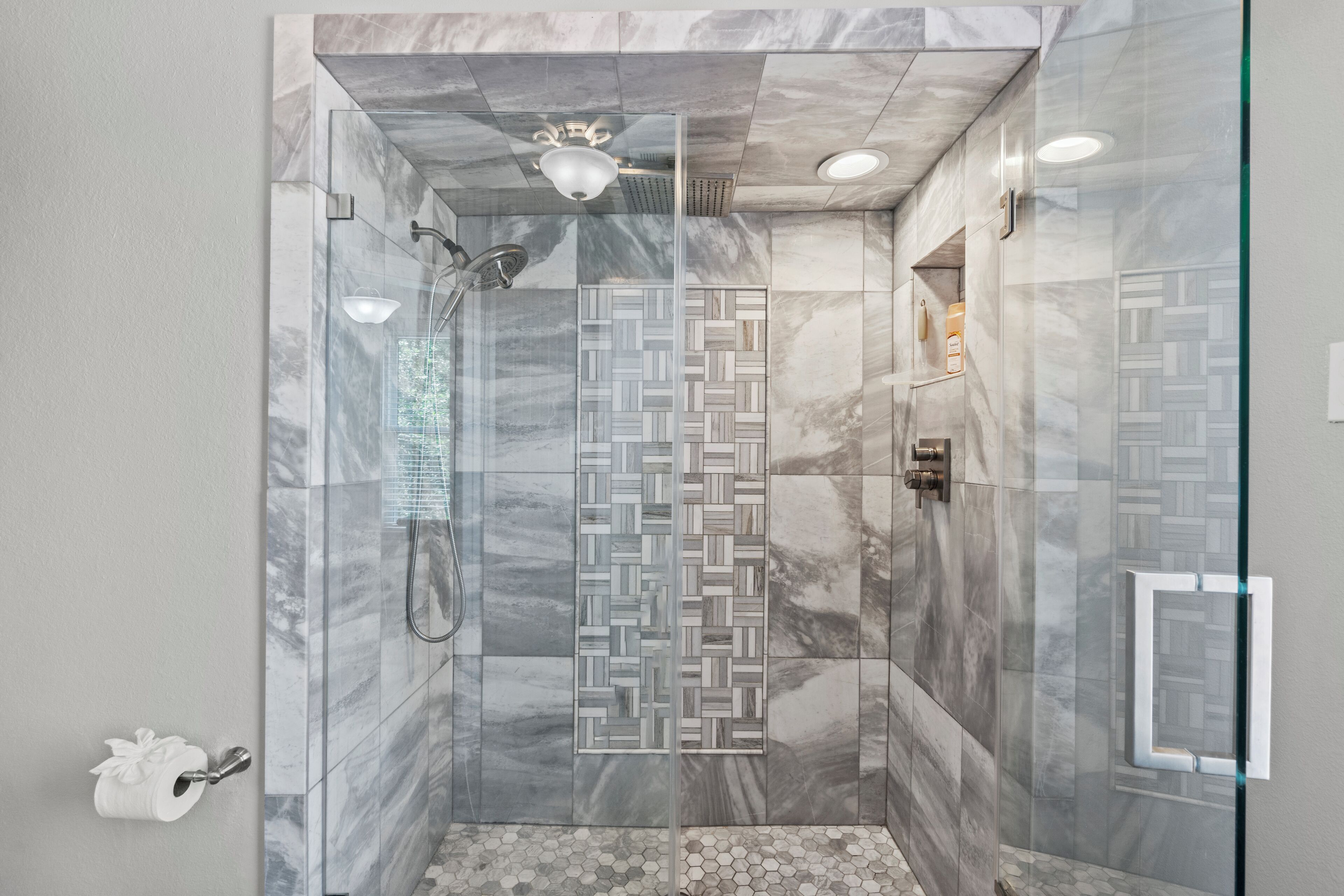 Combined shower/tub, hair dryer, towels, soap
