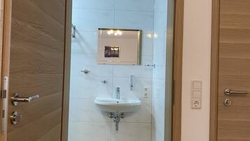 Shower, hair dryer, toilet paper