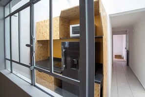 Fridge, microwave, stovetop, coffee/tea maker