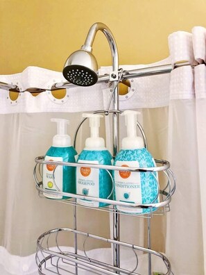 Bathtub, hair dryer, towels