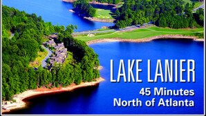 A scenic view of Lake Lanier with surrounding greenery and golf courses. - ❤️GREAT FOR FAMILIES❤️ (Lawrenceville)