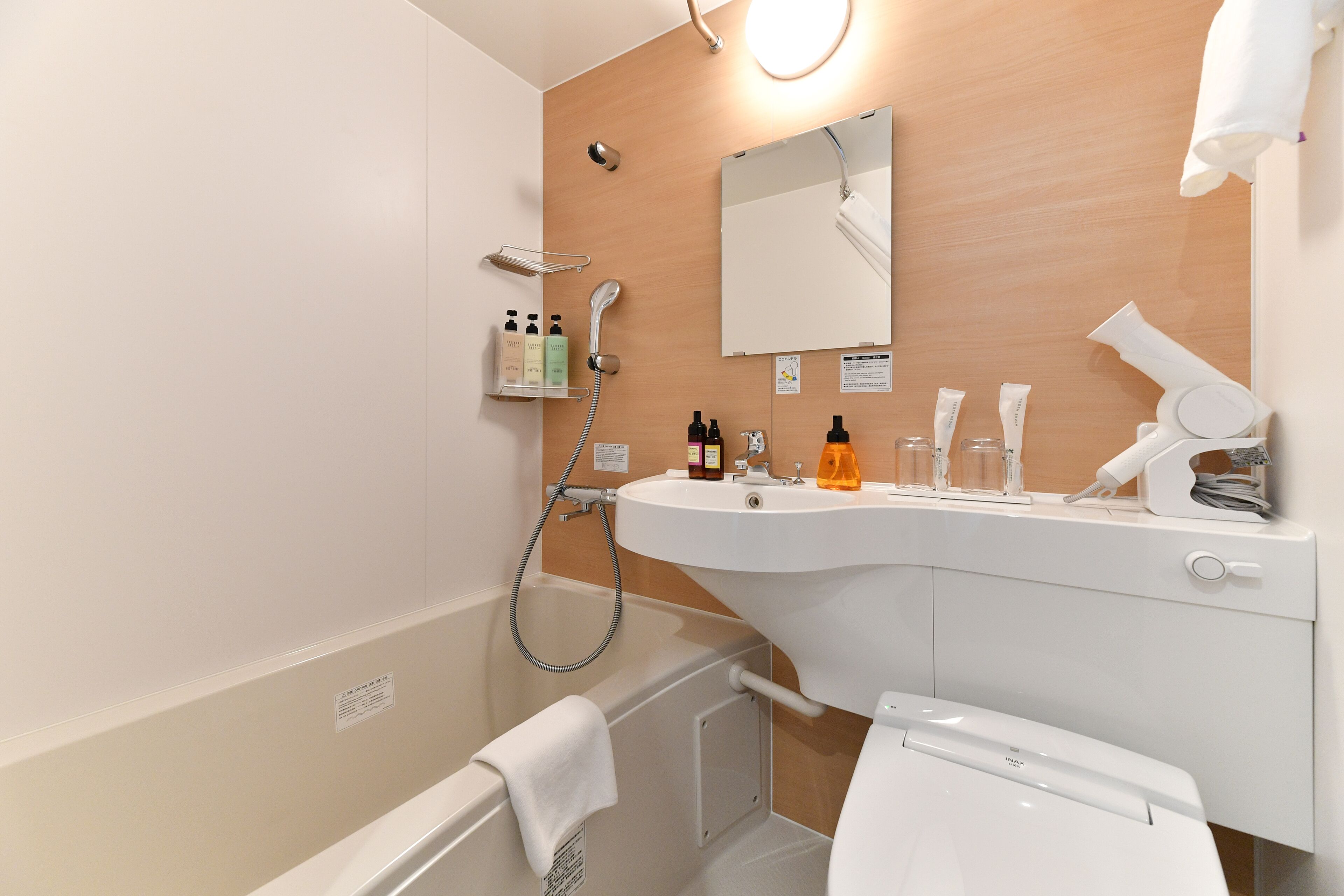 free toiletries, hair dryer, slippers, electronic bidet