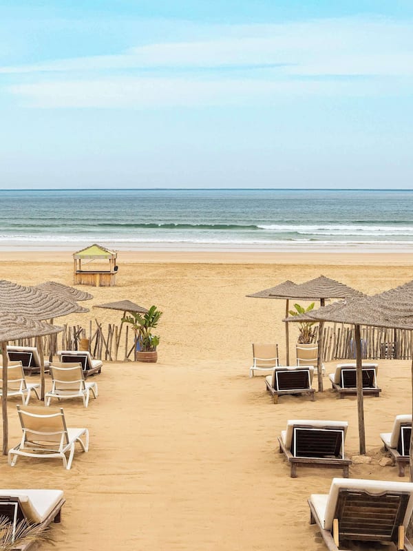 Private beach, beach umbrellas, beach towels, beach volleyball