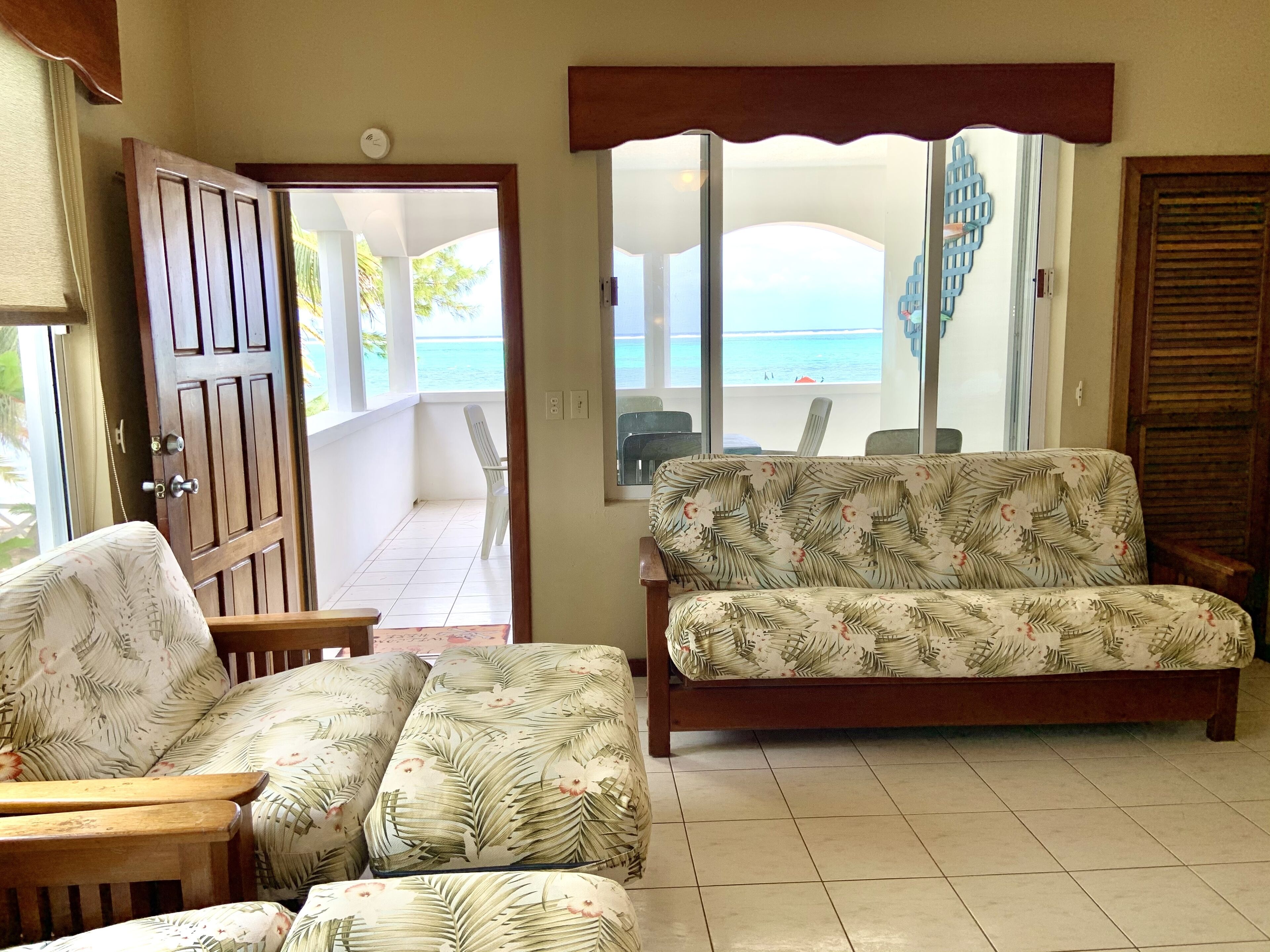 Condo (Suite 3A) | Living room | Flat-screen TV