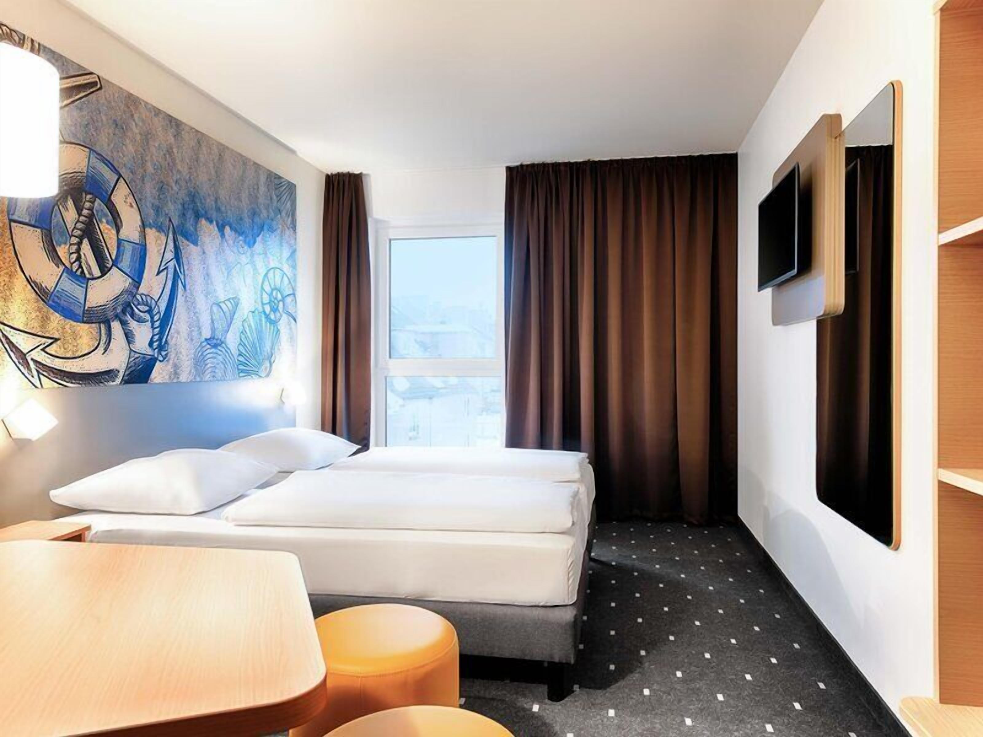 Twin kamer | Luxe beddengoed, een bureau, geluiddichte muren, gratis wifi