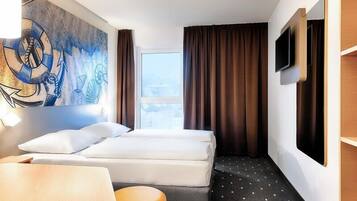 Twin kamer | Luxe beddengoed, een bureau, geluiddichte muren, gratis wifi