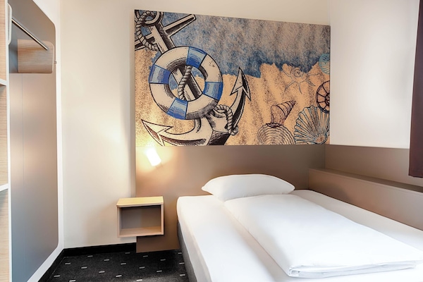 Ducha, secador de pelo, toallas y jabón