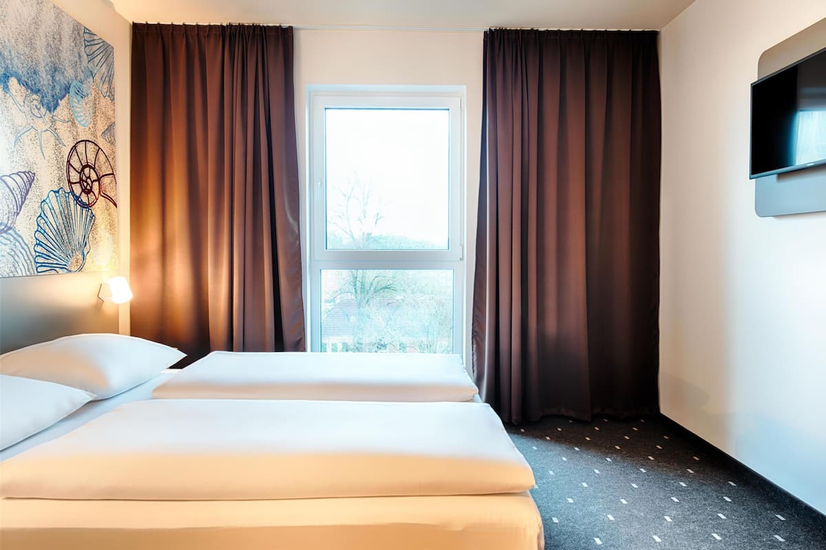 Chambre double | 1 chambre, literie de qualitĂ©, bureau, systĂšme dâinsonorisation