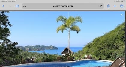 Great ocean views, walking distance to town/ beach, heated pool, family friendly