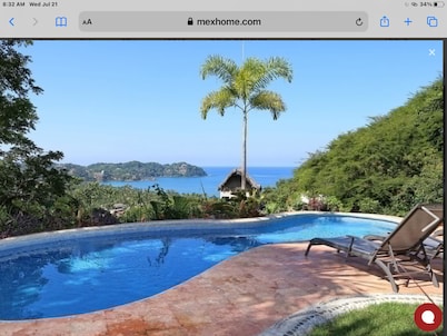 Great ocean views, walking distance to town/ beach, heated pool, family friendly