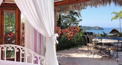 Great ocean views, walking distance to town/ beach, heated pool, family friendly