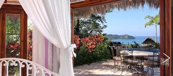 Great ocean views, walking distance to town/ beach, heated pool, family friendly