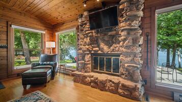 Smart TV, fireplace, books