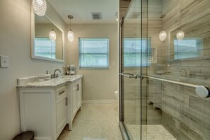 Shower, hair dryer, towels, soap