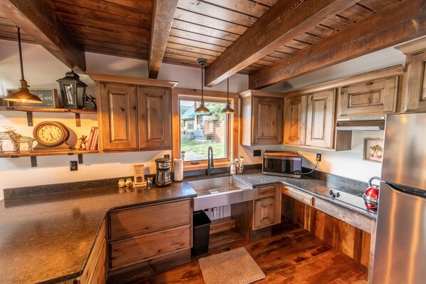 Fridge, microwave, stovetop, coffee/tea maker