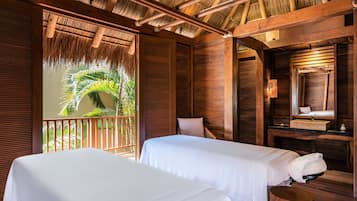 Relax in a tropical retreat with two single beds and a balcony.