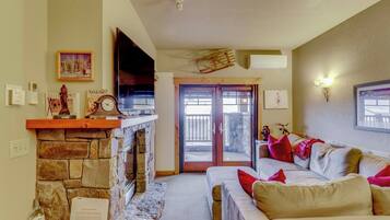 TV, fireplace, books, stereo